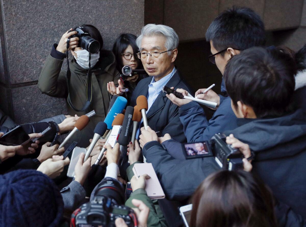 Junichiro Hironaka, chief lawyer of the former Nissan Motor chairman Carlos Ghosn, speaks to reporters in Tokyo, Japan, on Dec. 31, 2019. (Kyodo/via Reuters)