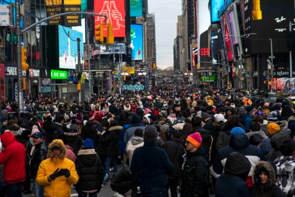 People wait to celebrate New Years eve in Times Square in New York City on Dec. 31, 2019. (Eduardo Munoz Alvarez/Getty Images)