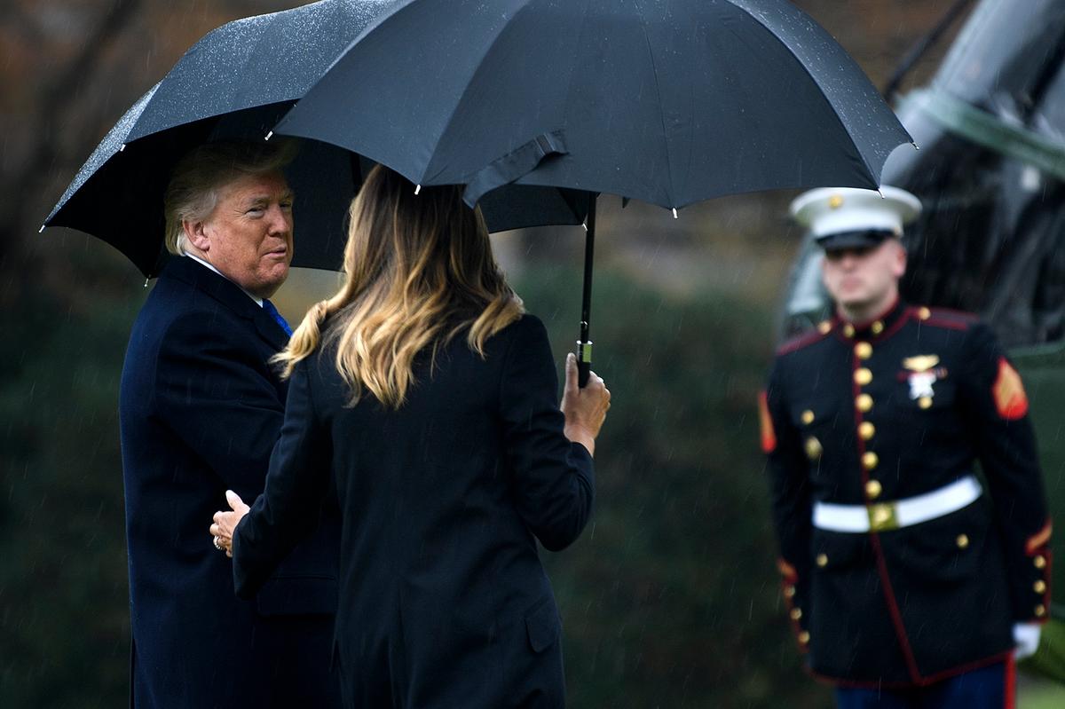 President Donald Trump and First Lady Melania Trump walk to Marine One, departing from the White House in Washington on Dec. 2, 2019. (Brendan Smialowski/AFP via Getty Images)