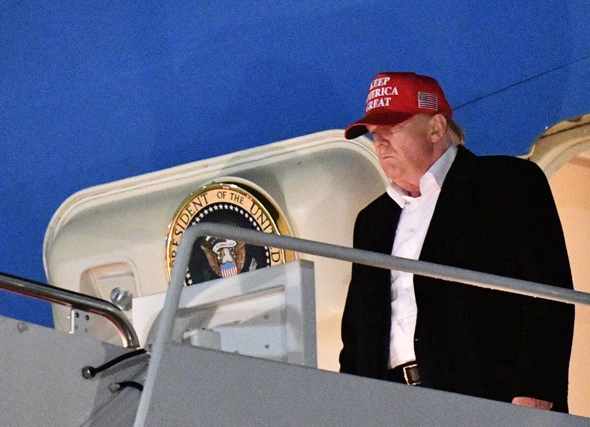 President Donald Trump steps off Air Force One upon arrival at Andrews Air Force Base, Maryland on Dec. 1, 2019. (Mandel Ngan/AFP via Getty Images)