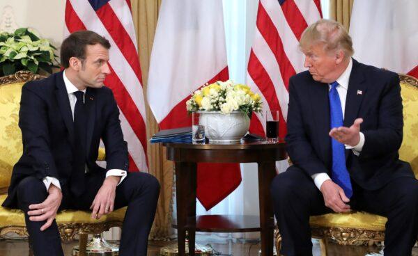 President Donald Trump (R) France's President Emmanuel Macron talk during their meeting at Winfield House in London on Dec. 3, 2019. (Ludovic Marin/AFP via Getty Images)