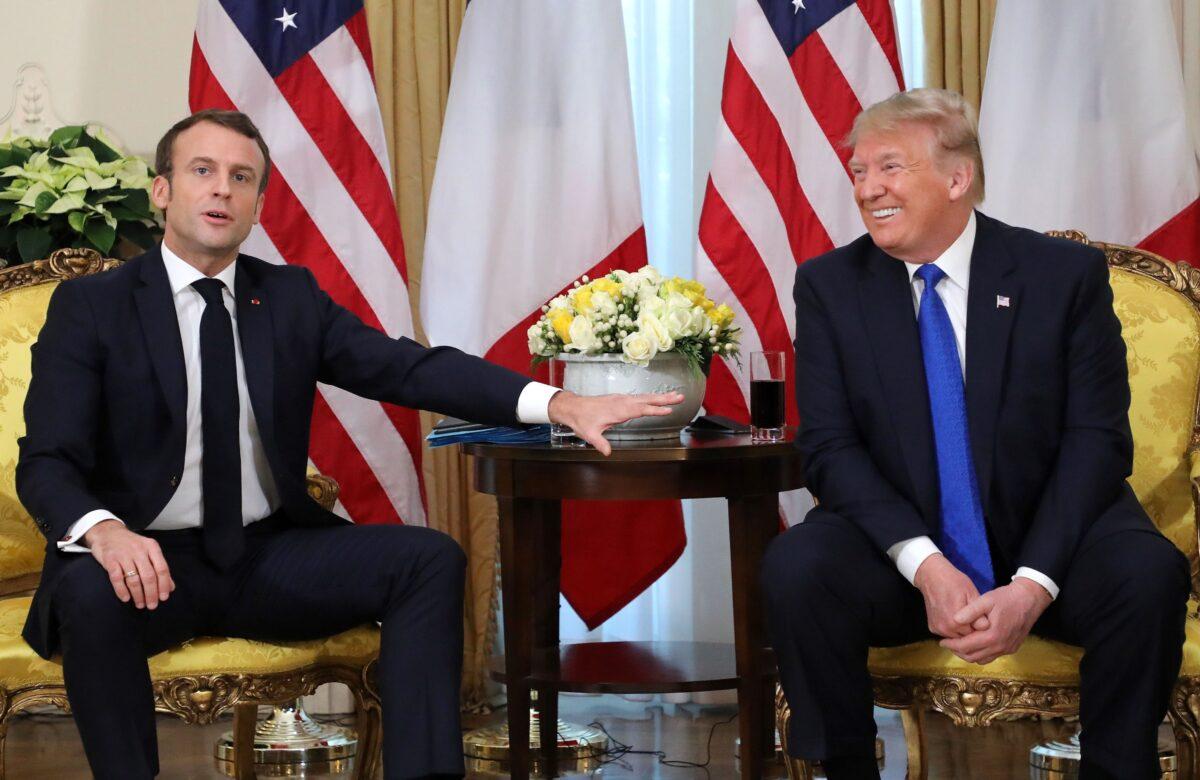 President Donald Trump and France's President Emmanuel Macron talk during a meeting at Winfield House in London on Dec. 3, 2019. (Ludovic Marin/AFP via Getty Images)
