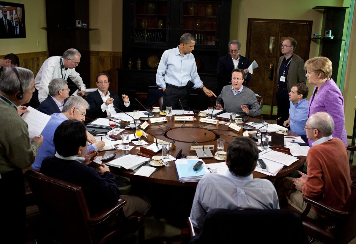 In this handout provided by The White House,President Barack Obama participates in a G8 Summit working session focused on global and economic issues, in the dining room of Laurel Cabin at Camp David, Maryland on May 19, 2012. (Pete Souza/The White House via Getty Images)