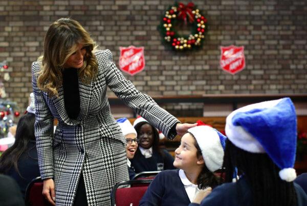 U.S. First Lady Melania Trump greets children during a visit at the Salvation Army Clapton centre, as the NATO summit takes place in Watford, in London, Britain, on Dec. 4, 2019. (Lisi Niesner/Reuters)