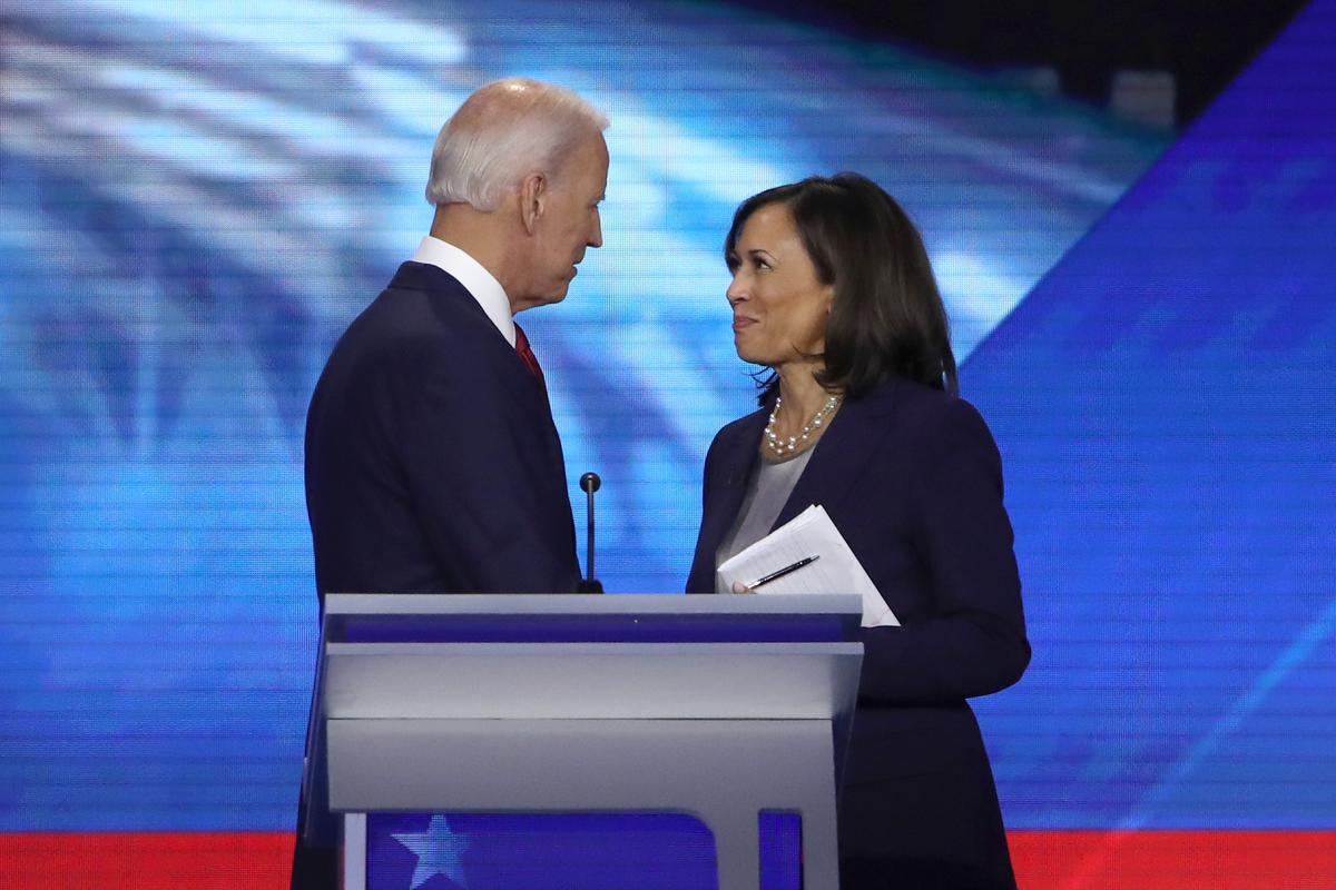 Democratic presidential candidates former Vice President Joe Biden and Sen. Kamala Harris (D-Calif.) speak after the Democratic Presidential Debate at Texas Southern University's Health and PE Center in Houston, Texas on Sept. 12, 2019. (Win McNamee/Getty Images)