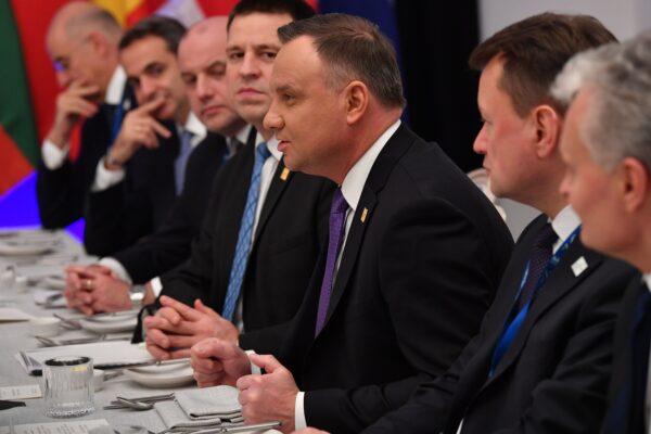 Poland's President Andrzej Duda (3R) speaks during a working lunch at the NATO summit at the Grove Hotel in Watford, northeast of London on Dec. 4, 2019. (Nicholas Kamm/AFP/Getty Images)