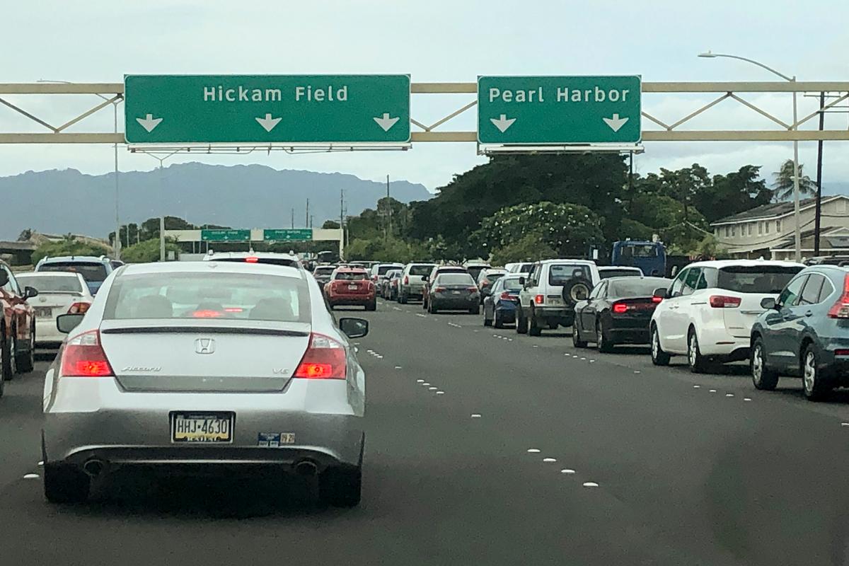 Traffic backs up at the main gates after a shooting at Pearl Harbor Naval shipyard Dec. 4, 2019, near Pearl Harbor in Honolulu. (AP Photo/Caleb Jones)