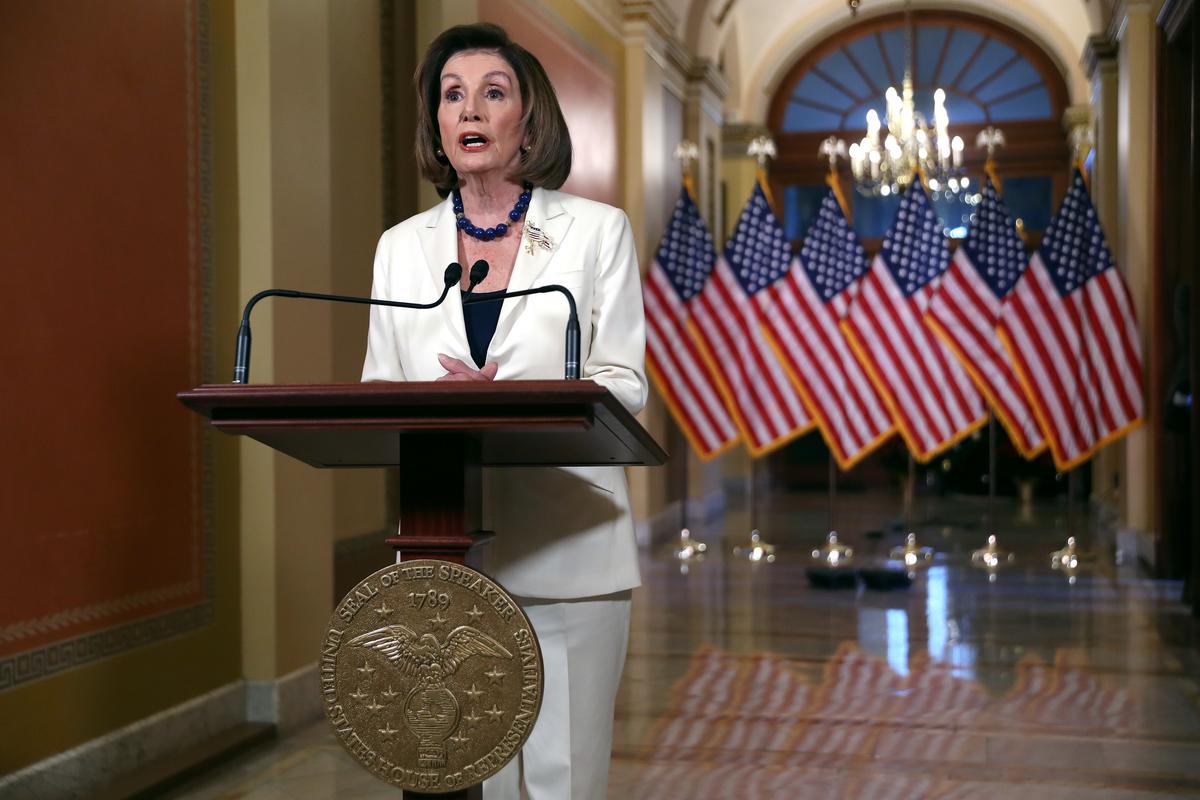 House Speaker Nancy Pelosi (D-Calif.) announces that the House will proceed with articles of impeachment against President Donald Trump at the Speaker's Balcony in the U.S. Capitol in Washington on Dec. 5, 2019. (Chip Somodevilla/Getty Images)
