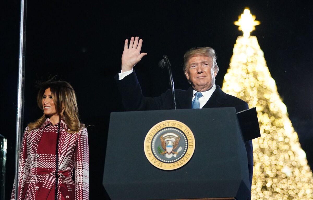 President Donald Trump and First Lady Melania Trump take part in the annual lighting of the National Christmas tree on The Ellipse in Washington on Dec. 5, 2019. (Mandel Ngan/AFP via Getty Images)