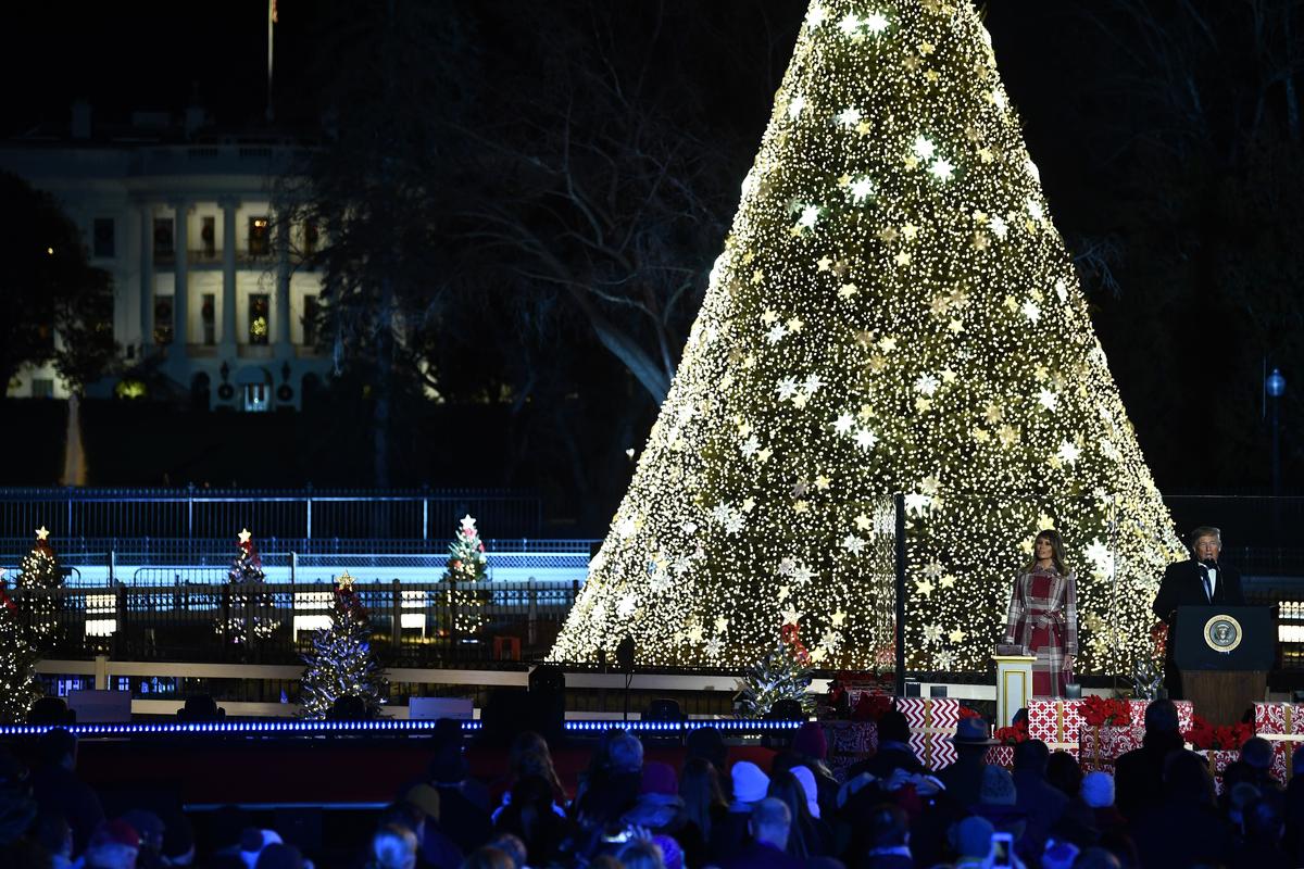 President Donald Trump and First Lady Melania Trump take part in the annual lighting of the National Christmas tree on The Ellipse in Washington, on Dec. 5, 2019. (Brendan Smialowski/AFP)