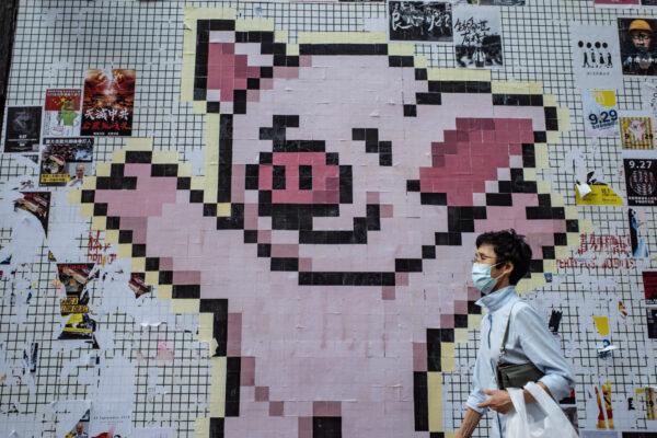 A mural of pixel pig, an icon of LIHKG also known as the Hong Kong version of Reddit, is seen on a Lennon Wall in Hong Kong, on Sept. 27, 2019. (Anthony Kwan/Getty Images)