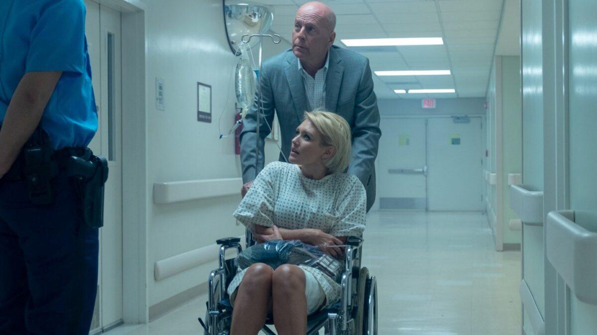 Madison Taylor (Nicky Whelan), a wounded witness to a crime, and Det. Wakes (Bruce Willis), in “Trauma Center.” (Lionsgate)