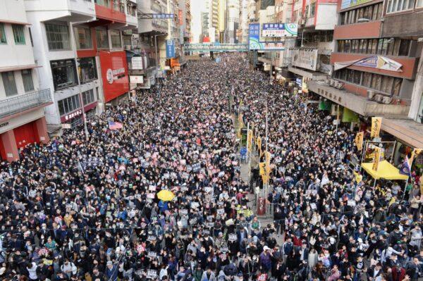 Tens of thousands of protesters march in the streets in Causeway Bay in Hong Kong on Dec. 8, 2019. (Sung Pi Lung/The Epoch Times)