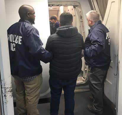 Bruno Padua-Silva being removed from the United States by ICE officers. (ICE)
