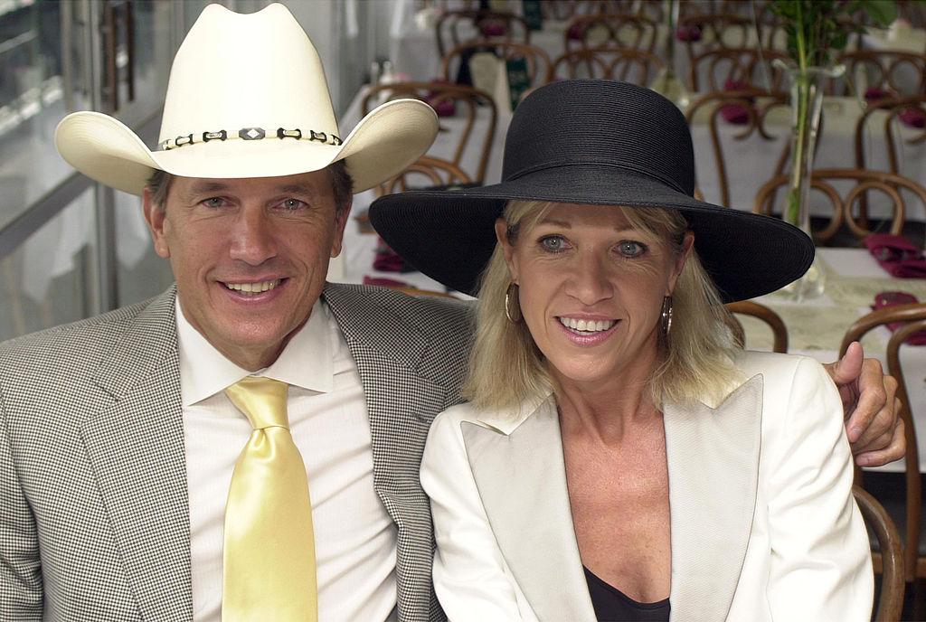 George and Norma Strait attend the 130th Running of the Kentucky Derby in 2004 in Louisville, Kentucky. (©Getty Images | <a href="https://www.gettyimages.com/detail/news-photo/george-strait-and-his-wife-norma-attend-the-130th-running-news-photo/50792463?adppopup=true">Mike Simons</a>)