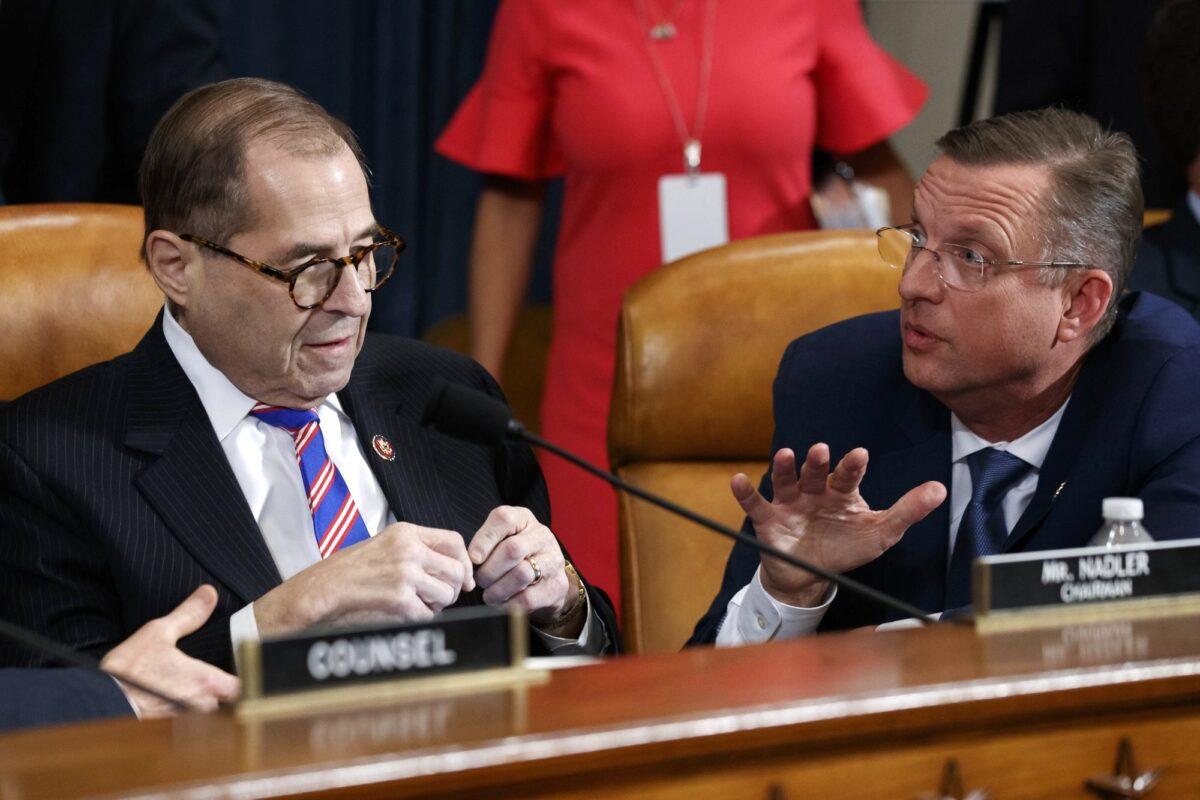 House Judiciary Committee Chairman Rep. Jerry Nadler (D-N.Y.) (L), listens to ranking member Rep. Doug Collins (R-Ga.), after the House Judiciary Committee hearing on the constitutional grounds for the impeachment of President Donald Trump on Capitol Hill on Dec. 4, 2019. (Alex Brandon/AP Photo)