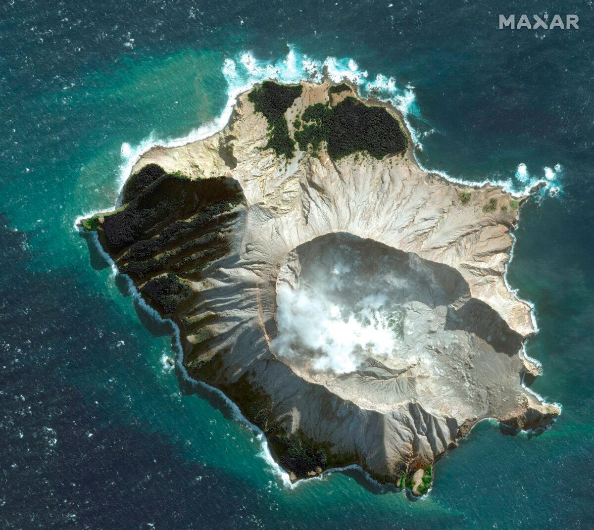 White Island in New Zealand before a volcano erupted on Monday, Dec. 9, 2019. (Satellite image May 12, 2019, Maxar Technologies via AP)