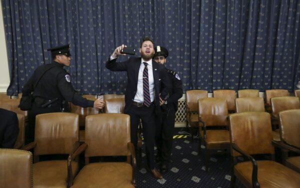 Owen Shroyer from InfoWars disrupts the open statement by House Judiciary Committee Chairman Jerrold Nadler in the Longworth House Office Building on Capitol Hill in Washington on Dec. 9, 2019. (Jonathan Ernst - Pool/Getty Images)