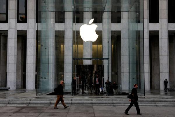 The Apple Inc. logo is seen hanging at the entrance to the Apple store on 5th Avenue in Manhattan, New York, on Oct. 16, 2019. (Mike Segar/Reuters)