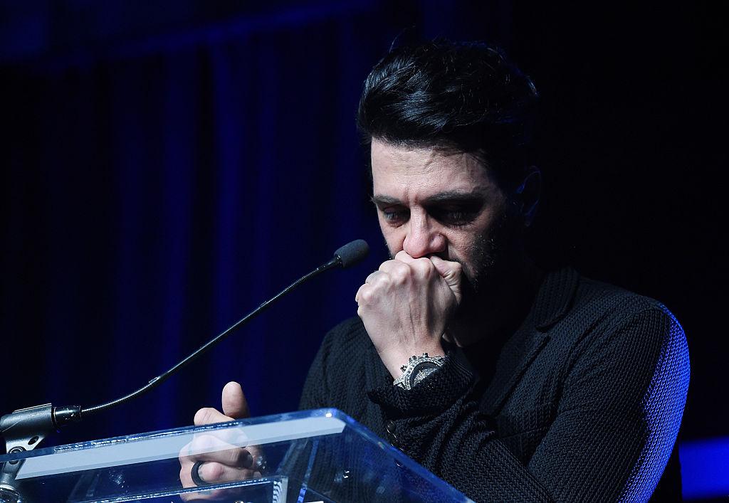 Angel overcome by emotion talking about his son at the Tyler Robinson Foundation gala benefiting families affected by pediatric cancer at Caesars Palace, Las Vegas, on Sept. 30, 2016 (©Getty Images | <a href="https://www.gettyimages.com/detail/news-photo/illusionist-criss-angel-becomes-emotional-while-talking-news-photo/611731722?adppopup=true">Ethan Miller</a>)