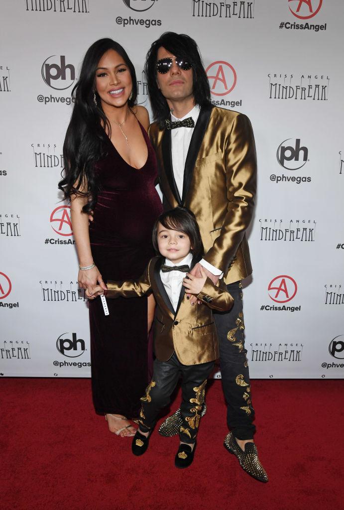 Angel with Shaunyl and Johnny at the grand opening of "Criss Angel: Mindfreak" at the Las Vegas Planet Hollywood Resort & Casino on Jan. 19, 2019 (©Getty Images | <a href="https://www.gettyimages.com/detail/news-photo/shaunyl-benson-johnny-crisstopher-sarantakos-and-news-photo/1096820980?adppopup=true">Ethan Miller</a>)