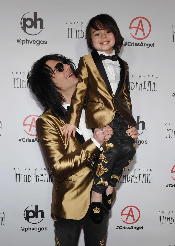 Angel with Johnny at the grand opening of "Criss Angel: Mindfreak" on Jan. 19, 2019 (©Getty Images | <a href="https://www.gettyimages.com/detail/news-photo/illusionist-criss-angel-and-johnny-crisstopher-sarantakos-news-photo/1097092996?adppopup=true">Ethan Miller</a>)