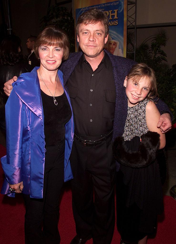 York, Hamill, and their daughter, Chelsea, at the premiere of "Joseph: King of Dreams" at the Egyptian Theater in Los Angeles, California, on Oct. 30, 2000 (©Getty Images | <a href="https://www.gettyimages.com/detail/news-photo/mark-hamill-his-wife-marilou-and-daughter-chelsea-at-the-news-photo/2246869?adppopup=true">Kevin Winter</a>)