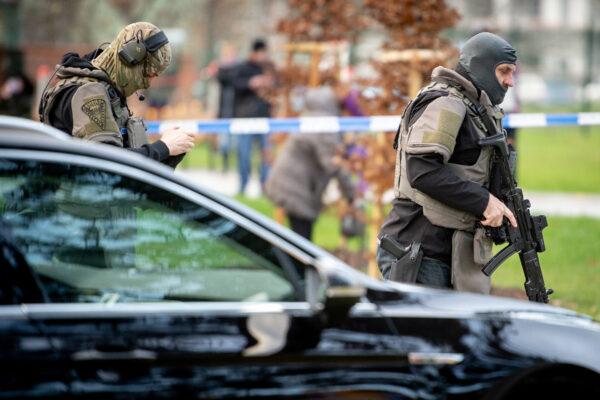 Police officers are seen near the site of a shooting in front of a hospital in Ostrava, Czech Republic on Dec. 10, 2019. (Lukas Kabon/Reuters)
