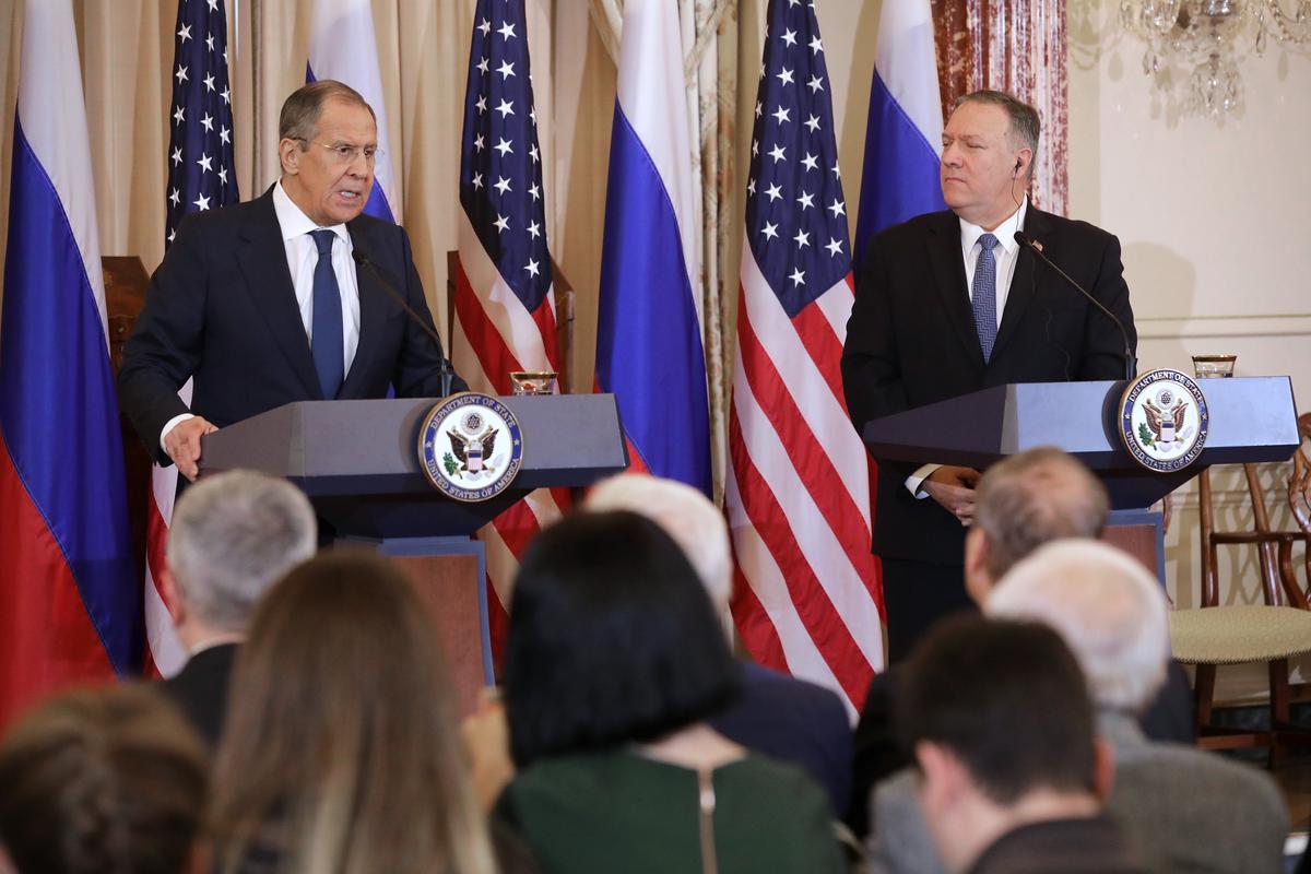 Russian Foreign Minister Sergey Lavrov, left, and U.S. Secretary of State Mike Pompeo hold a joint news conference in the Franklin Room at the State Department in Washington on Dec. 10, 2019. (Chip Somodevilla/Getty Images)