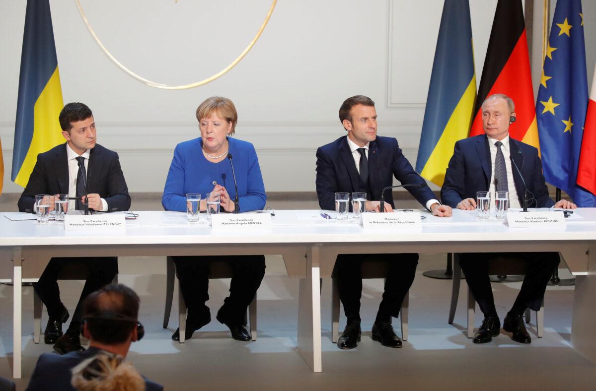 (L to R) Ukraine's President Volodymyr Zelenskyy , Germany's Chancellor Angela Merkel, France's President Emmanuel Macron and Russia's President Vladimir Putin attend a joint news conference after a Normandy-format summit in Paris, France on Dec. 9, 2019. (Charles Platiau/Pool/Reuters)
