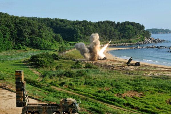 In this handout photo released by the United States Forces Korea, U.S. M270 Multiple Launch Rocket System firing an MGM-140 Army Tactical Missile on the east coast of South Korea on July 5, 2017. (United States Forces Korea via Getty Images)