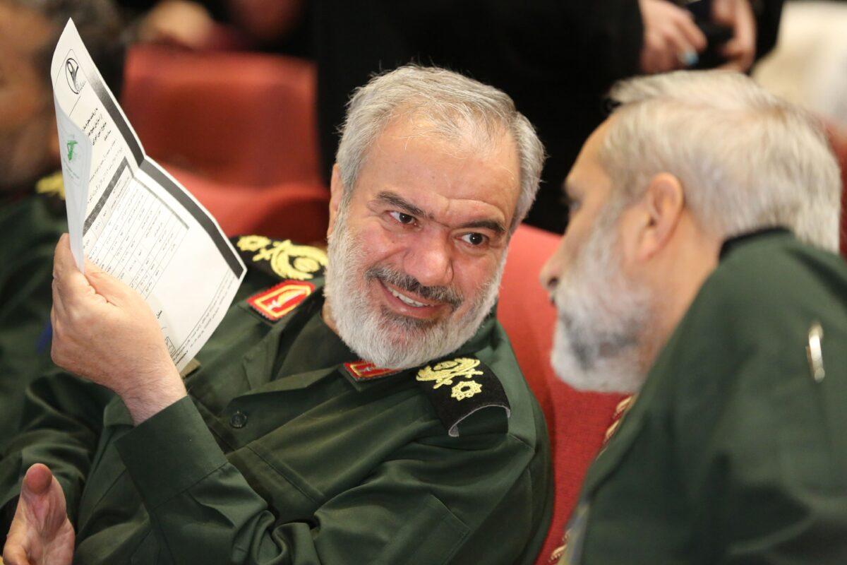Ali Fadavi, deputy chief of the Islamic Revolution Guards Corps (IRGC), left, speaks to another member of the military during Basij Week in the Iranian capital Tehran on Nov. 24, 2019. (Atta Kenare/AFP via Getty Images)