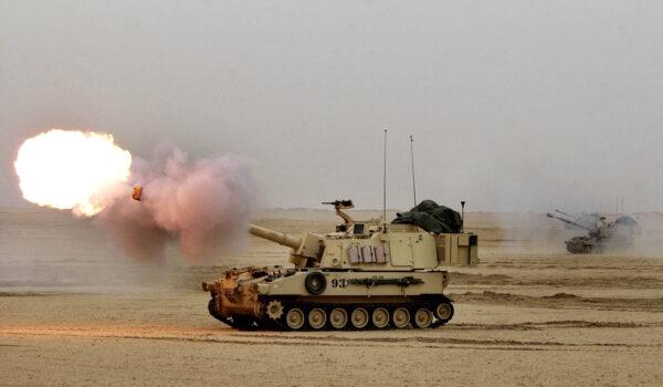 A U.S. Army Paladin M-109A6 155 mm self-propelled howitzer fires during live-fire exercises near the Iraqi border in northern Kuwait on Feb. 13, 2003. (Scott Nelson/Getty Images)