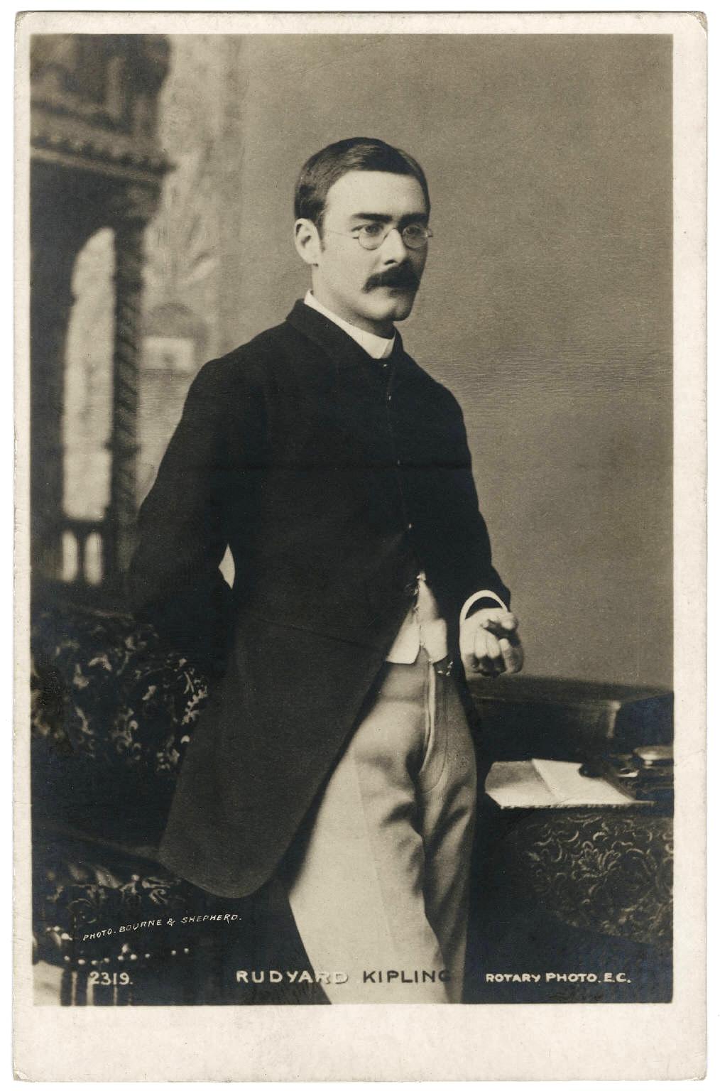 A photographic portrait of Rudyard Kipling as a postcard, by Bourne & Shepherd. Beinecke Rare Book & Manuscript Library, Yale University. (Public Domain)