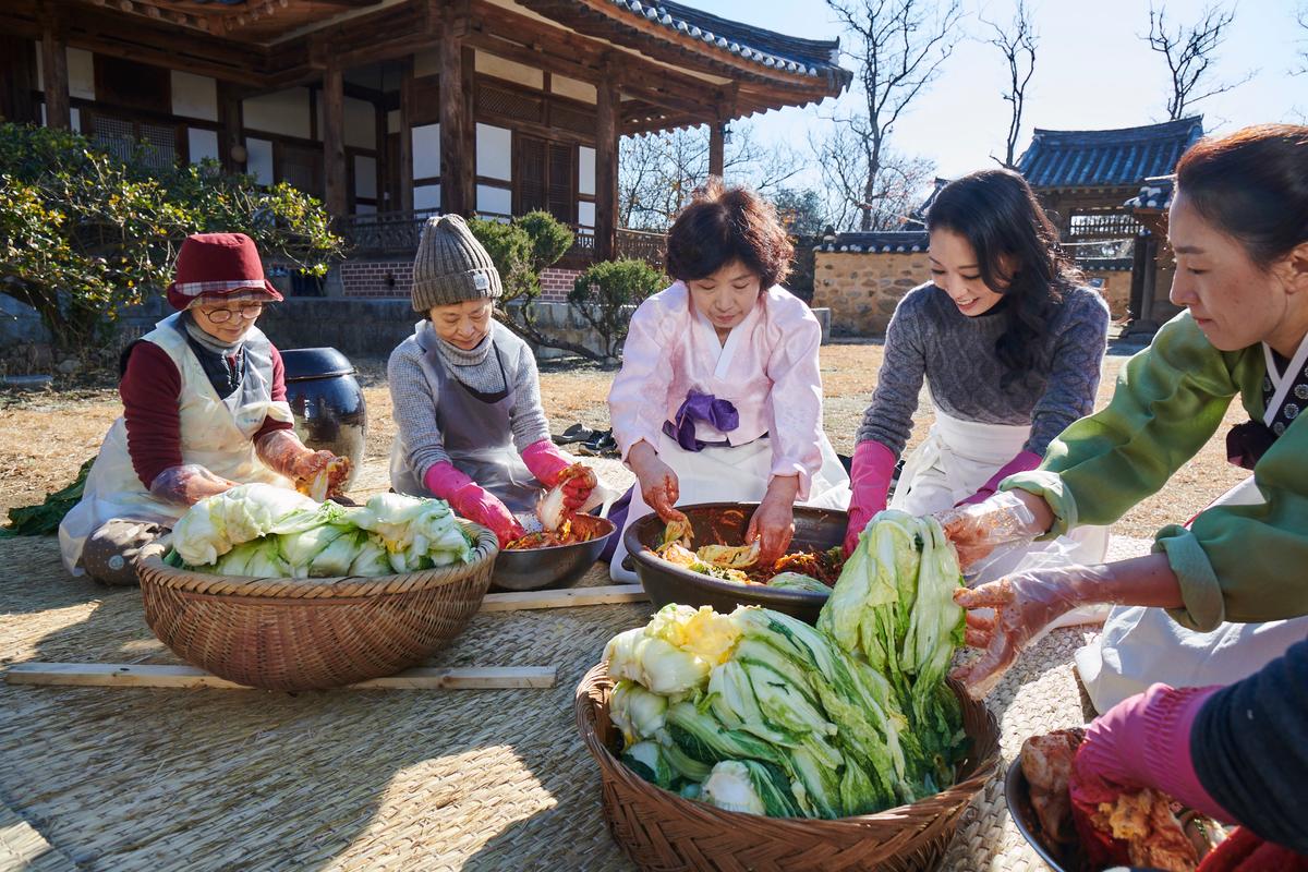 Kimjang, the annual tradition of making and sharing kimchi, is a communal affair. (Courtesy of Nasoya)