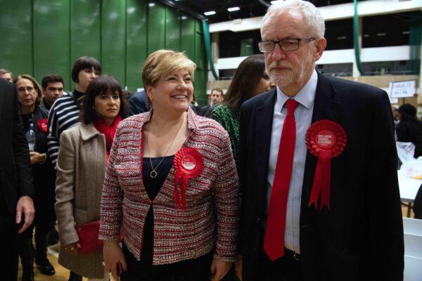 UK Labour Party leader Jeremy Corbyn (R) and Shadow Foreign Secretary Emily Thornberry meet after both retaining their Parliamentary seats following the count at Sobell leisure centre in London on Dec. 13, 2019. (Leon Neal/Getty Images)