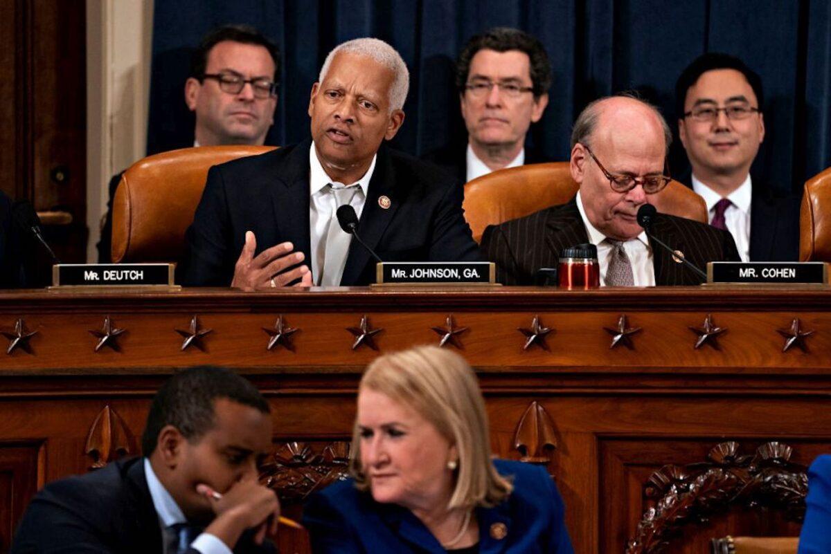 (L–R) Rep. Hank Johnson (D-Ga.) speaks as Rep. Steve Cohen (D-Tenn.) listens during a House Judiciary Committee markup hearing on the Articles of Impeachment against President Donald Trump at the Longworth House Office Building in Washington on Dec. 12, 2019. (Andrew Harrer/Getty Images)