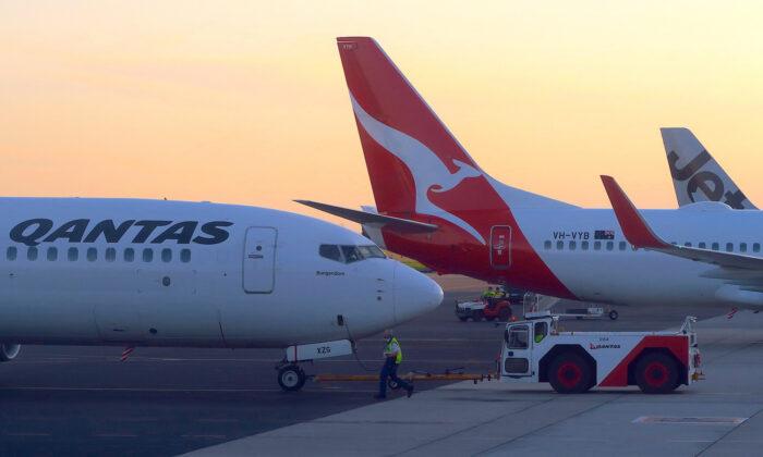 Qantas Passengers Escape Smoke-Filled Plane as Captain Says ‘Evacuate, Evacuate’