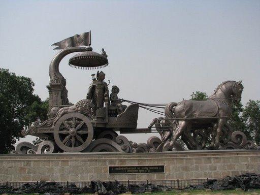 A bronze chariot with Lord Krishna and Arjuna in the city of Kurukshetra. (Public Domain)