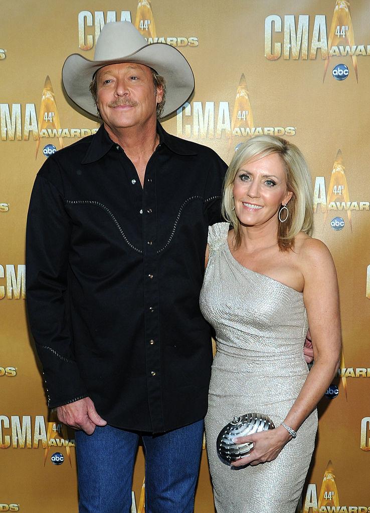 Alan and Denise Jackson at the 44th Annual CMA Awards at the Bridgestone Arena in Nashville, Tennessee, on Nov. 10, 2010 (©Getty Images | <a href="https://www.gettyimages.com/detail/news-photo/alan-jackson-and-denise-jackson-attend-the-44th-annual-cma-news-photo/106687347?adppopup=true">Larry Busacca</a>)