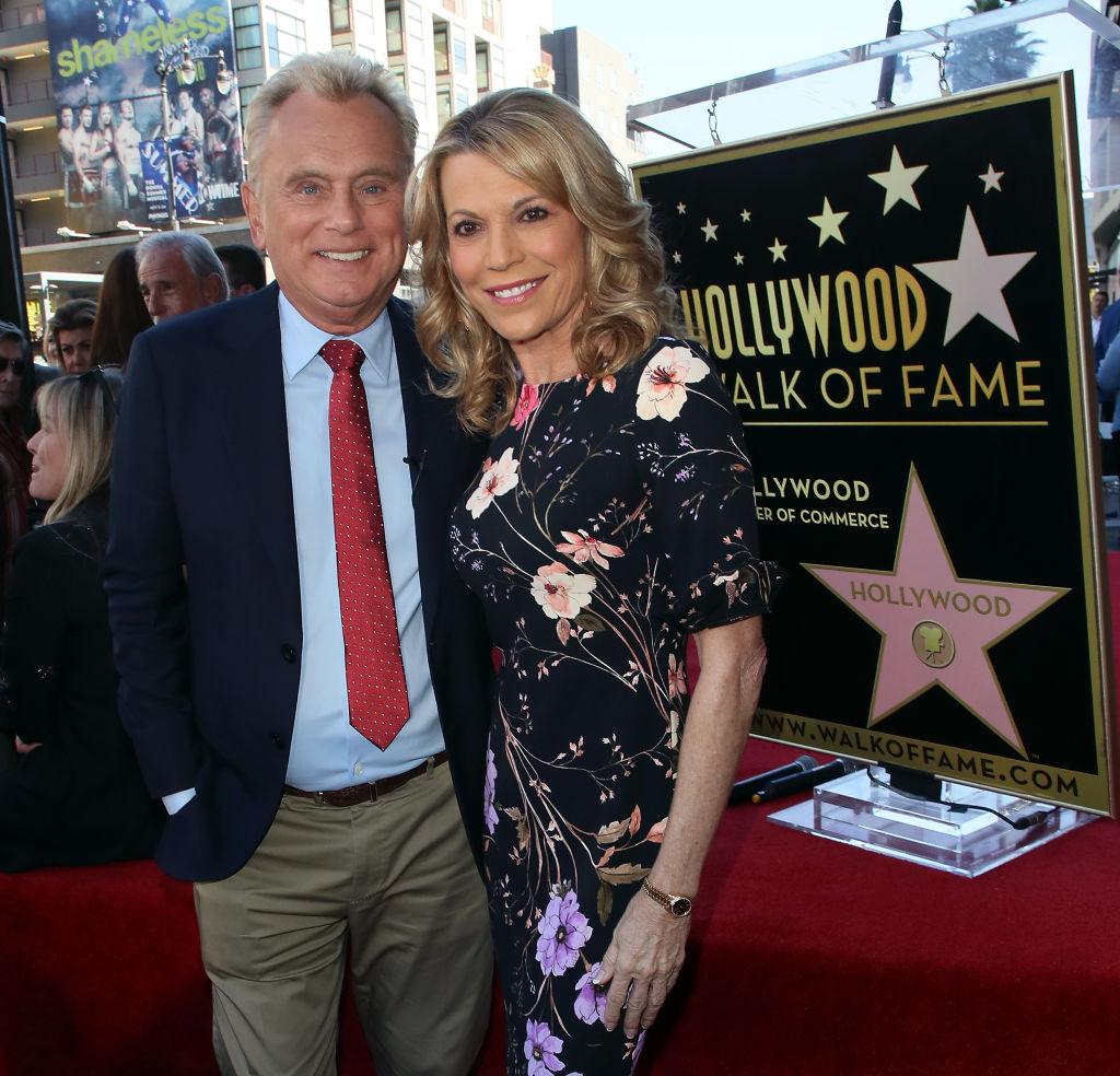 Sajak and White attend as Wheel of Fortune's executive director Harry Friedman is honored with a star on the Hollywood Walk of Fame on Nov. 1, 2019. (©Getty Images | <a href="https://www.gettyimages.com/detail/news-photo/pat-sajak-and-vanna-white-attend-harry-friedman-being-news-photo/1184902623?adppopup=true">David Livingston</a>)