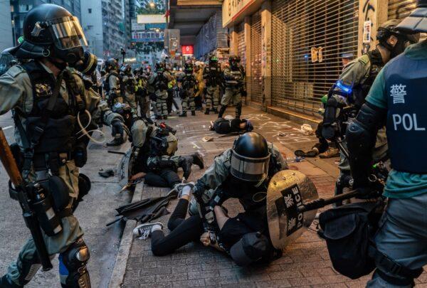 Pro-democracy protesters arrested by police during a clash at a demonstration in Wan Chai district in Hong Kong, China, on Oct. 6, 2019. (Anthony Kwan/Getty Images)