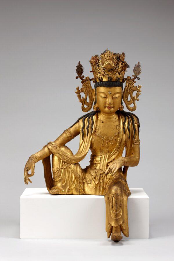 Bodhisattva Avalokiteshvara (Gwaneum) Korea, Goryeo Dynasty, circa 1220–1285.<br/>Gilt wood and gilt copper and iron with crystal inlays. (National Museum of Korea, Seoul)