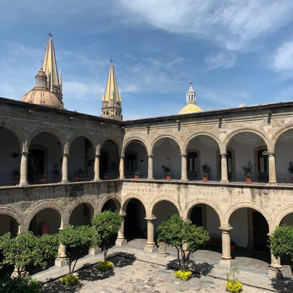 The peaceful interior of the Palacio de Gobierno takes on a golden hue due do the inclusions in the limestone. (Amanda Burrill)