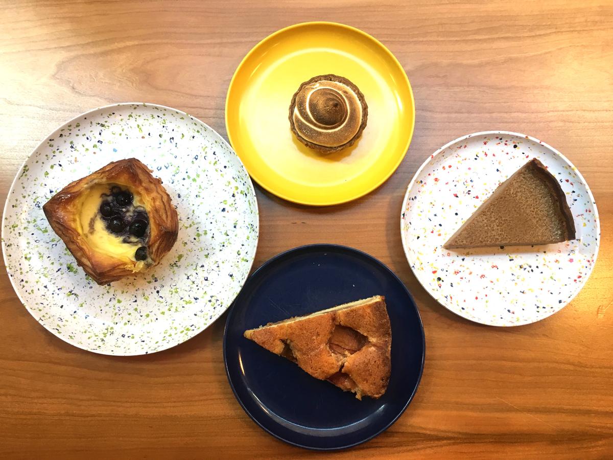 (Clockwise from top) S'mores tart, pumpkin spice cake, plum cake, and blueberry danish. (Channaly Philipp/The Epoch Times)