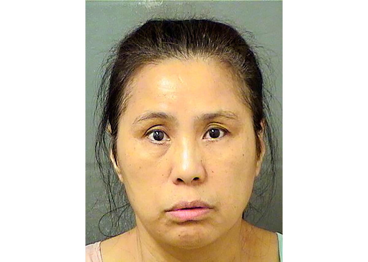 This Dec. 18, 2019 booking photo provided by the Palm Beach County Sheriff's Office, in Fla., shows Jing Lu. Lu, a Chinese national who trespassed at President Donald Trump's Mar-a-Lago club on Wednesday, and was arrested when she refused to leave, police said. This is the second time this year a Chinese national has been charged with illicitly entering the Florida resort. (Palm Beach County Sheriff's Office via AP)
