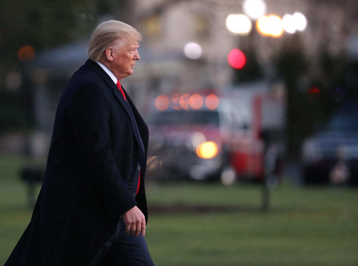 WASHINGTON, DC - DECEMBER 18: U.S. President Donald Trump walks toward Marine One prior to his departure for a campaign event in Battle Creek, Michigan, December 18, 2019, at the White House in Washington, DC. Today the U.S. House of Representatives is scheduled to vote on the two impeachment articles against President Trump. (Mark Wilson/Getty Images)
