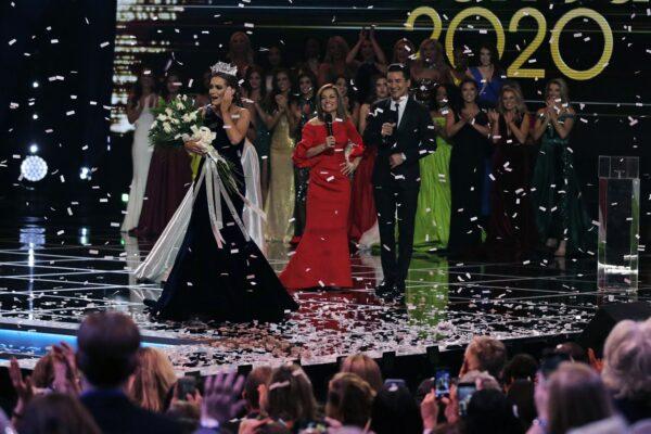 Camille Schrier, of Virginia, left, reacts after winning the Miss America competition at the Mohegan Sun casino in Uncasville, Conn., on Dec. 19, 2019. (Charles Krupa/AP Photo)