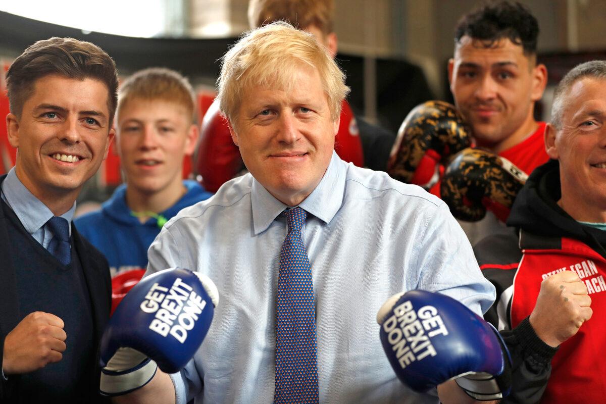 Britain's Prime Minister Boris Johnson during a stop in his General Election Campaign trail at Jimmy Egan's Boxing Academy in Manchester, England, on Nov. 19, 2019. (Frank Augstein/Getty Images)