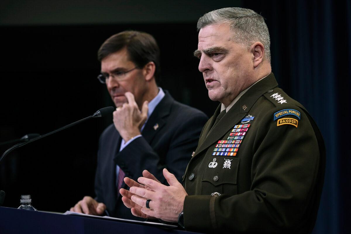 (L-R) Secretary of Defense Mark Esper and Chairman of the Joint Chiefs of Staff Army Gen. Mark Milley hold an end of year press conference at the Pentagon in Arlington, Va., on Dec. 20, 2019. Esper and Milley fielded questions on a wide range of topics, including the situation in North Korea and a recent Washington Post story that disclosed the "Afghanistan Papers." (Drew Angerer/Getty Images)
